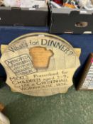 Novelty wooden board with revolving centre marked 'What's for dinner, approved by Guardians of