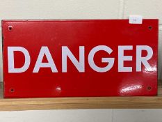 A white on red warning sign "DANGER"