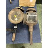 Two vintage coaching lamps, non matching, one with damaged glass panelling, largest 45cm high