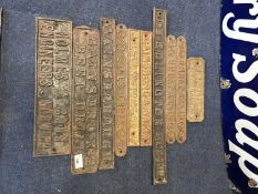 Group of various iron maker's plates for carts and implements to include R Hunt & Co, Burton of