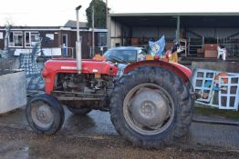 A Massey Ferguson 3 cylinder 196, road registered, foot plates, lights, tipping and returns pipe,