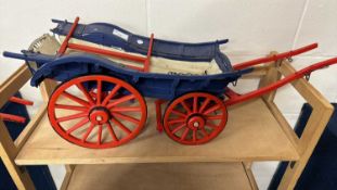 A scratch built model of a Glamorgan Shear Wagon painted in blue, red and black, 77cm long in total