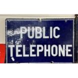 A double sided flag-type enamel sign "Public Telephone"