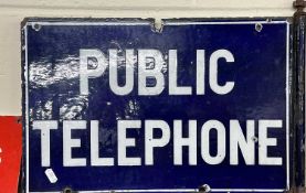 A double sided flag-type enamel sign "Public Telephone"