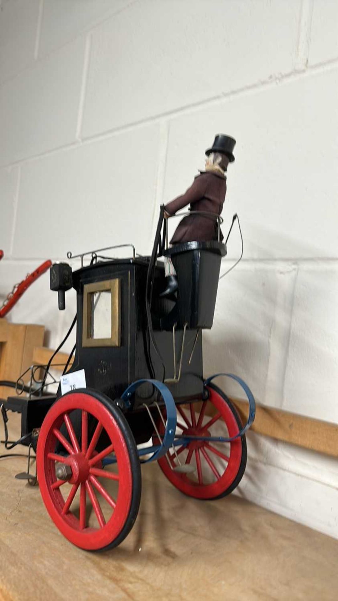 A scratch built model of a Victorian carriage painted in black with red wheels together with a - Image 4 of 9