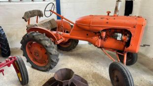 An Allis-Chalmers vintage Tractor, appears subject to a prior restoration but now ready for some
