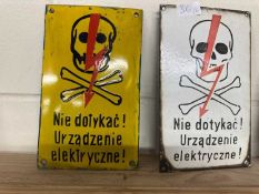 Two Polish electrical danger signs