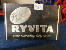 Small sheet metal sign marked Ryvita, 23cm wide