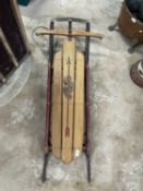 Vintage wood and metal sledge marked 'Flexible Flyer'
