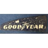 A painted plywood sign marked Goodyear, 51cm wide