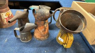 Mixed Lot: Six various vintage oil cans and two funnels including examples marked Castrol, Shell