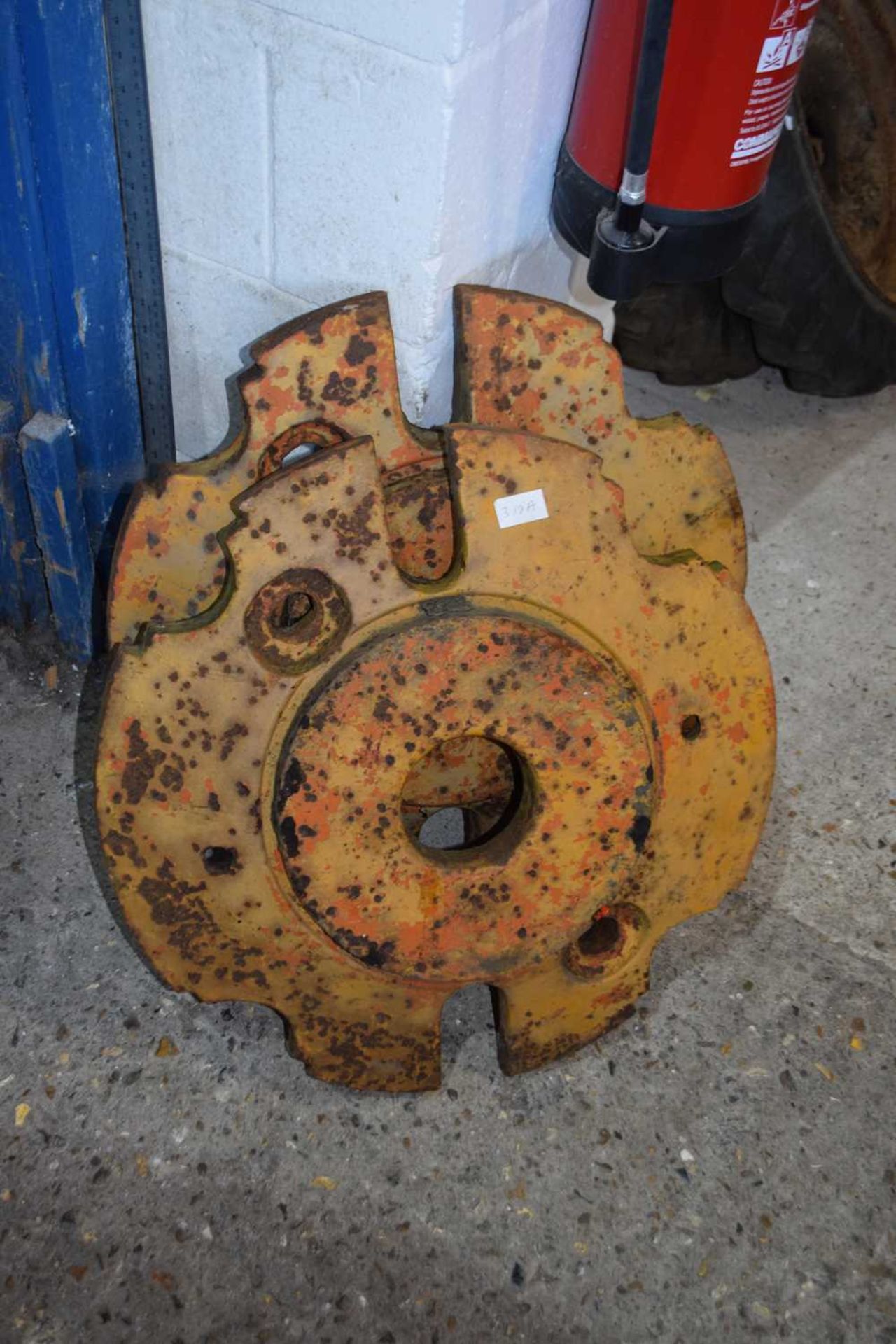 Pair of Allis Chalmers iron wheel weights