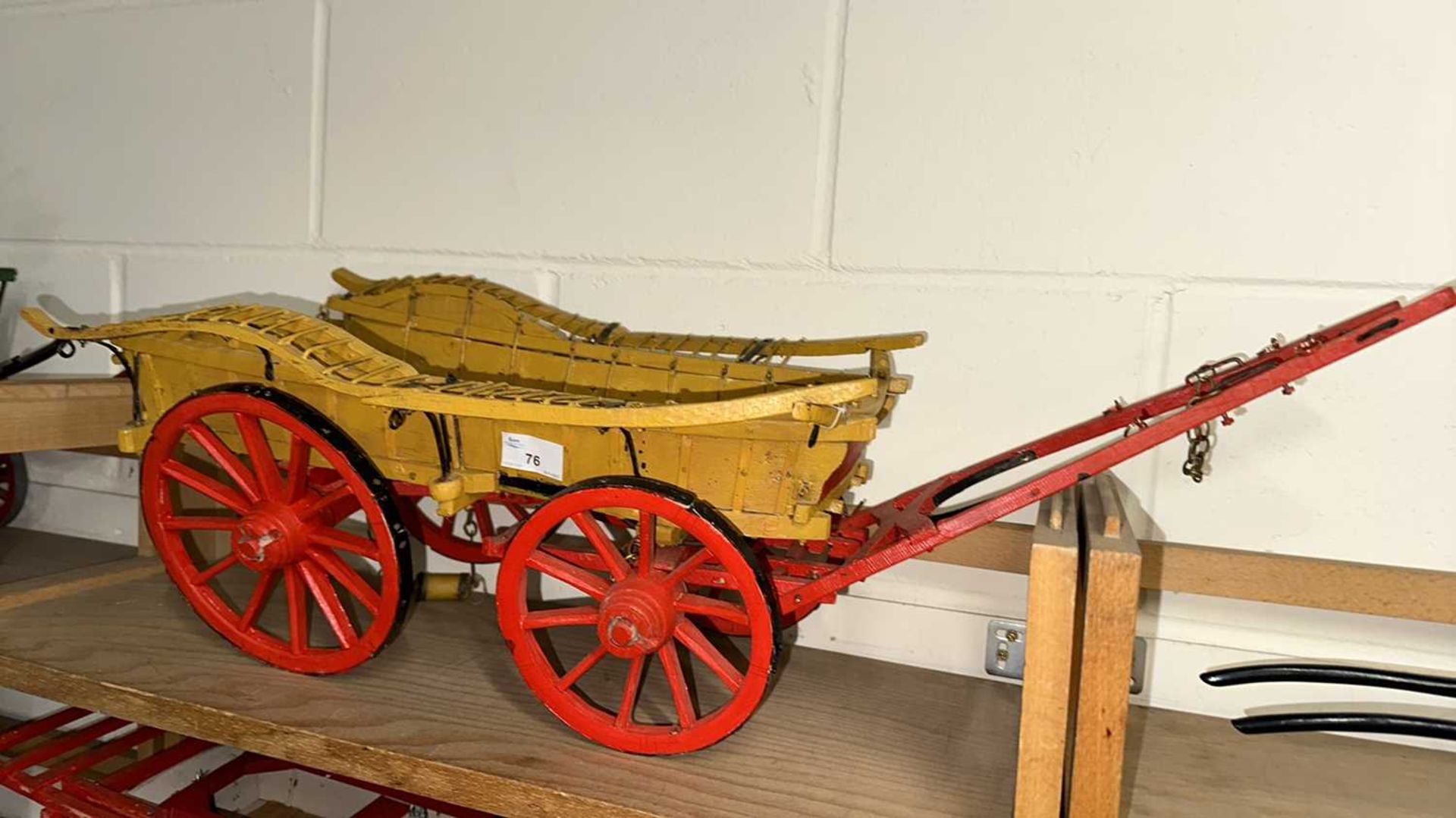 A scratch built model of an Oxford Wagon, painted in beige and red, approx 80cm long in total