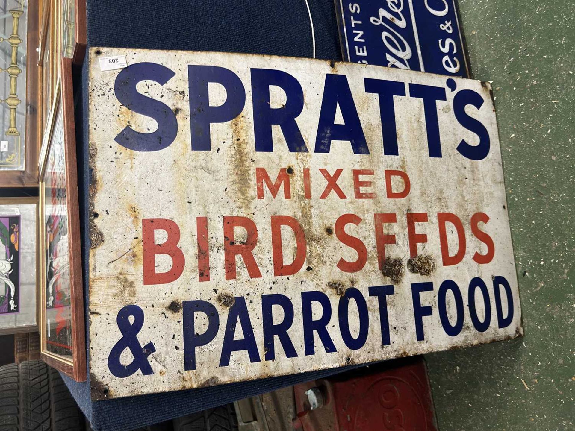 Enamel signed 'Spratt's Mixed birdseed and parrot food'