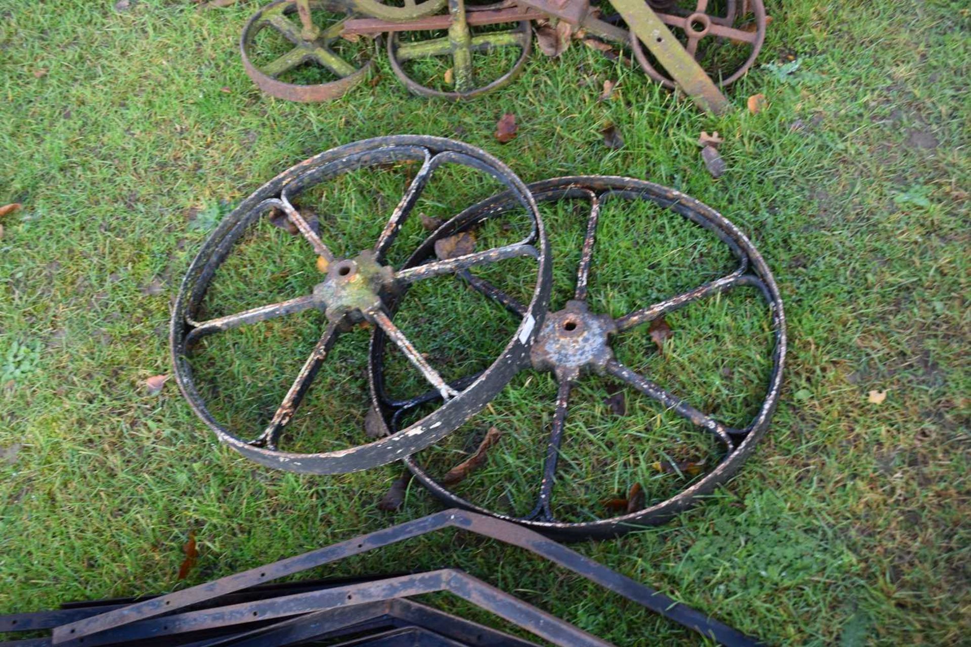 A pair of iron implement wheels