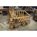 Wood framed four wheel hand cart with hand brakes