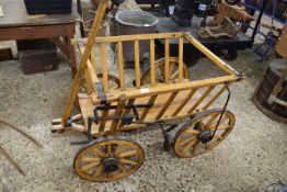 Wood framed four wheel hand cart with hand brakes