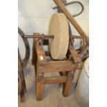 Wood framed grinding wheel