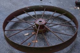 A single iron wheel, 117cm diameter, unpainted