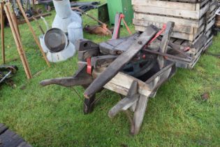 A wooden wheel barrow together with various sundry attachments