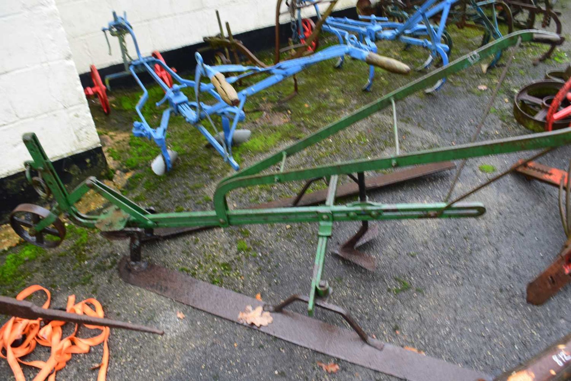 An iron framed horse drawn cultivator