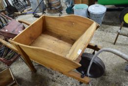 Vintage wooden framed wheelbarrow