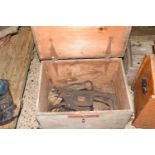 Wooden box containing various horse leathers