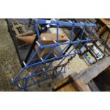 Small blue painted iron harrow