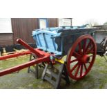 Single axle farm cart with blue and red painted body, (significantly deteriorated condition)