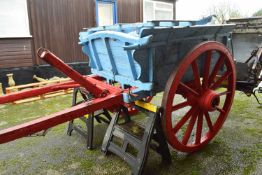 Single axle farm cart with blue and red painted body, (significantly deteriorated condition)