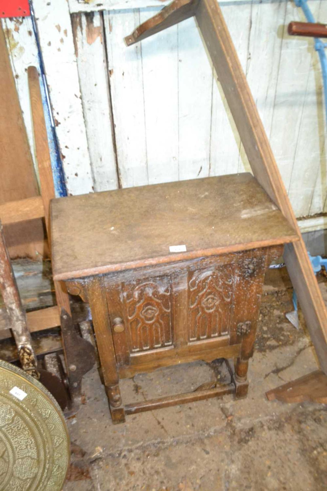 Carved oak bedside cabinet