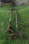 Mixed Lot: A wood and iron single furrow plough together with a similar cultivator bearing name