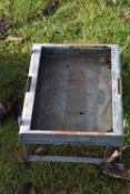A galvanised stand marked Eltex
