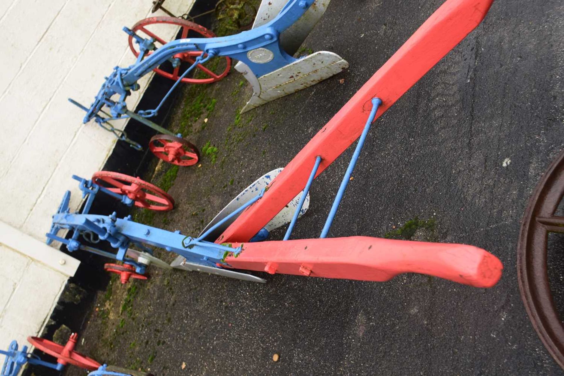 A large iron and wood framed horse drawn single furrow plough, painted in red and blue - Image 2 of 2