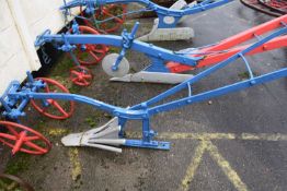 A horse drawn iron framed plough with ridging frame, body painted blue, silver and red