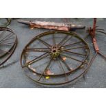 A pair of large iron wheels, 132cm diameter