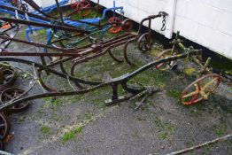 A horse drawn iron framed plough, for restoration