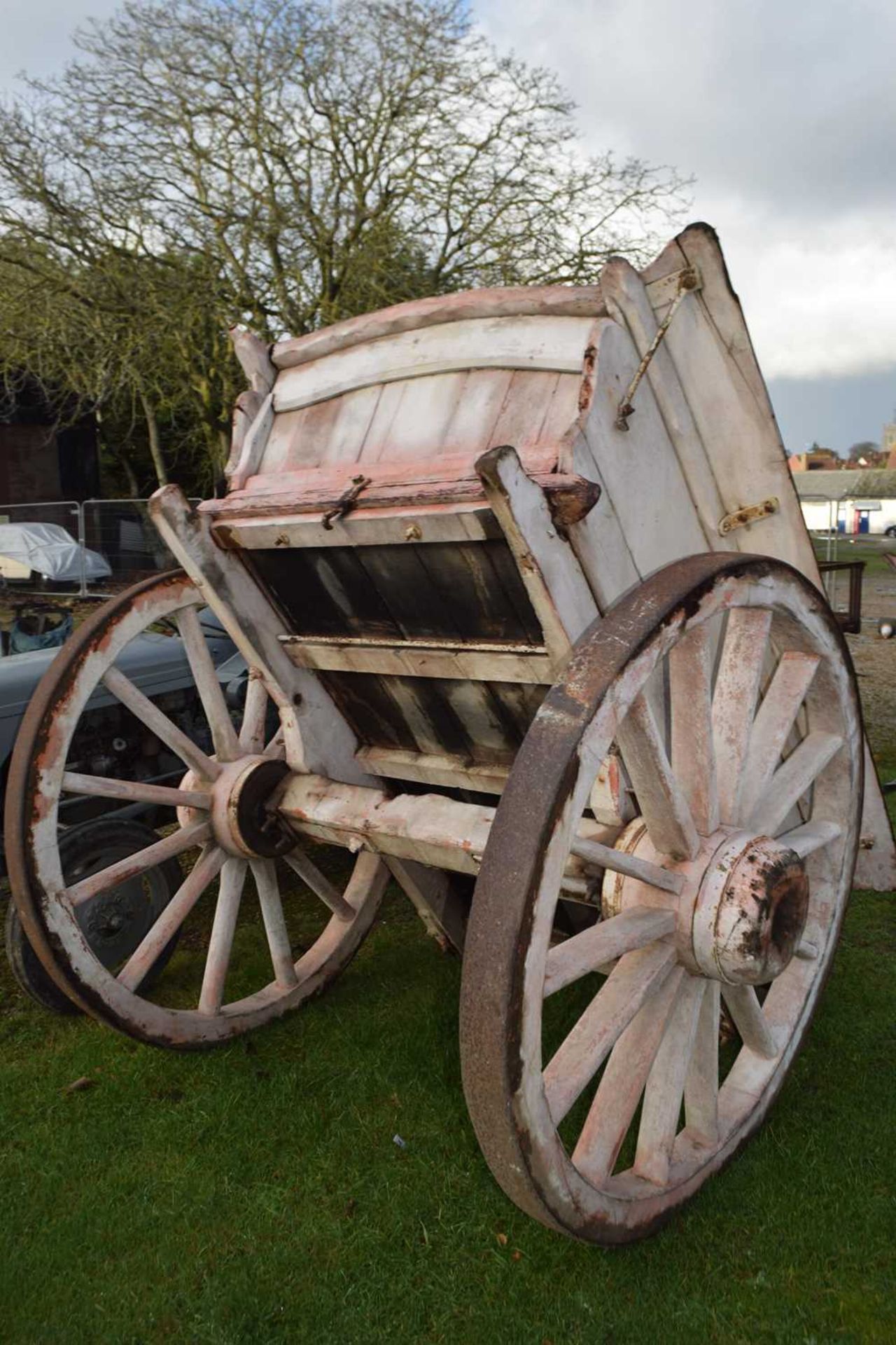 A single axle wood framed farm cart, for restoration