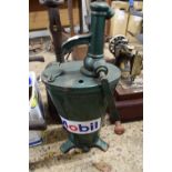 Small hand operated oil dispenser marked Mobil