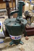 Small hand operated oil dispenser marked Mobil