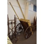 Small single axle cart with iron mounted wheels