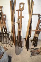 Bundle of implements to include turfing iron, various spades etc
