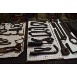 Three display boards, various pliers, spanners, sockets and other implements