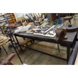Large iron framed work bench with two vices