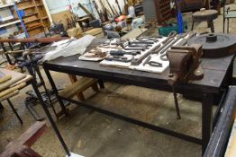 Large iron framed work bench with two vices