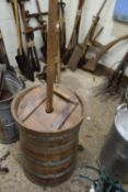 Iron framed wooden barrel with integral stirrer, possibly for dairy or laundry use