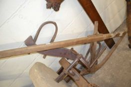 Wooden plough plus one other