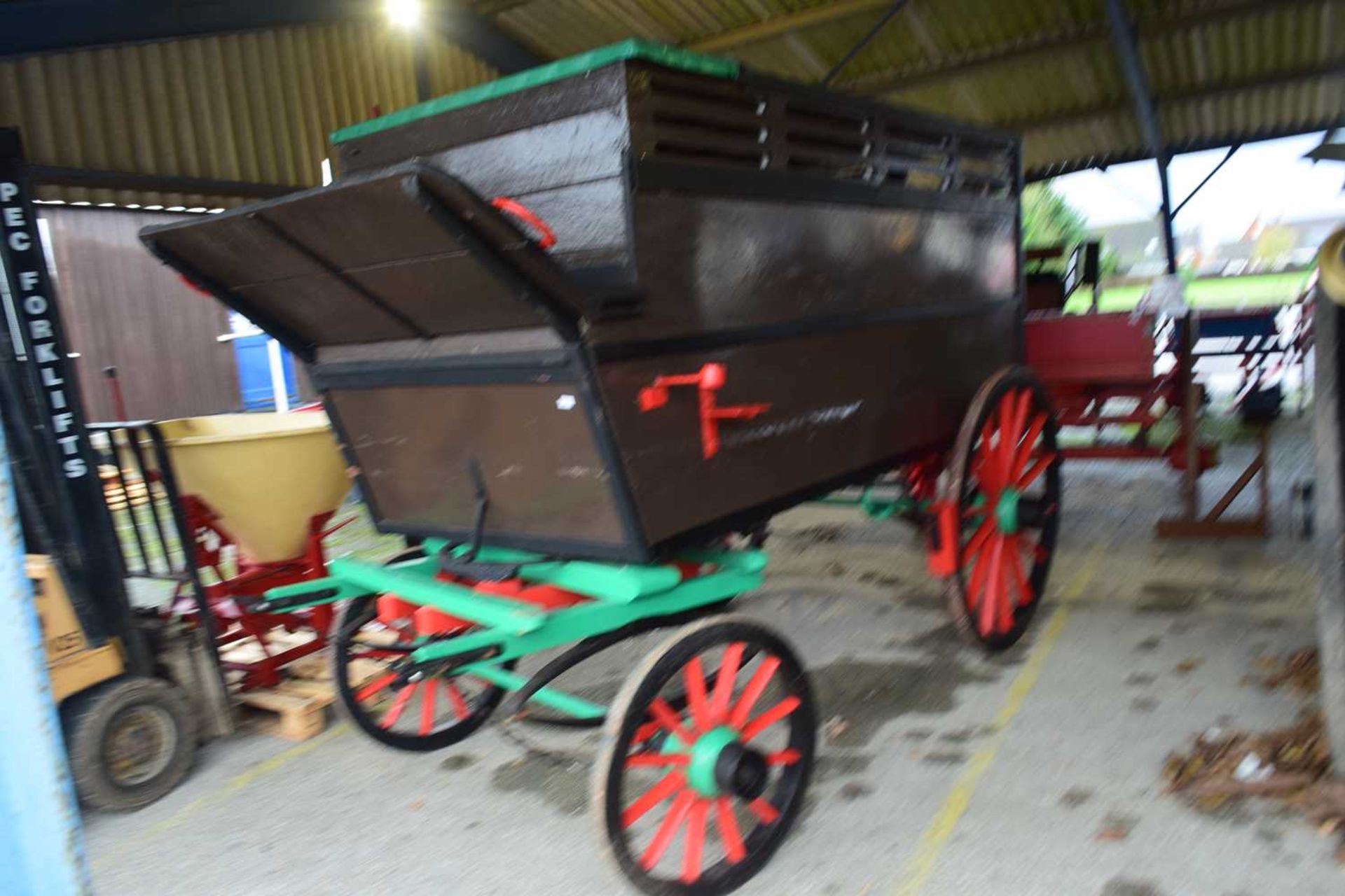 Double axle and wood panelled covered cart with ventilation to sides, for goods transport