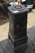 Miniature cast iron stove