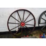 A wood framed and iron mounted cartwheel